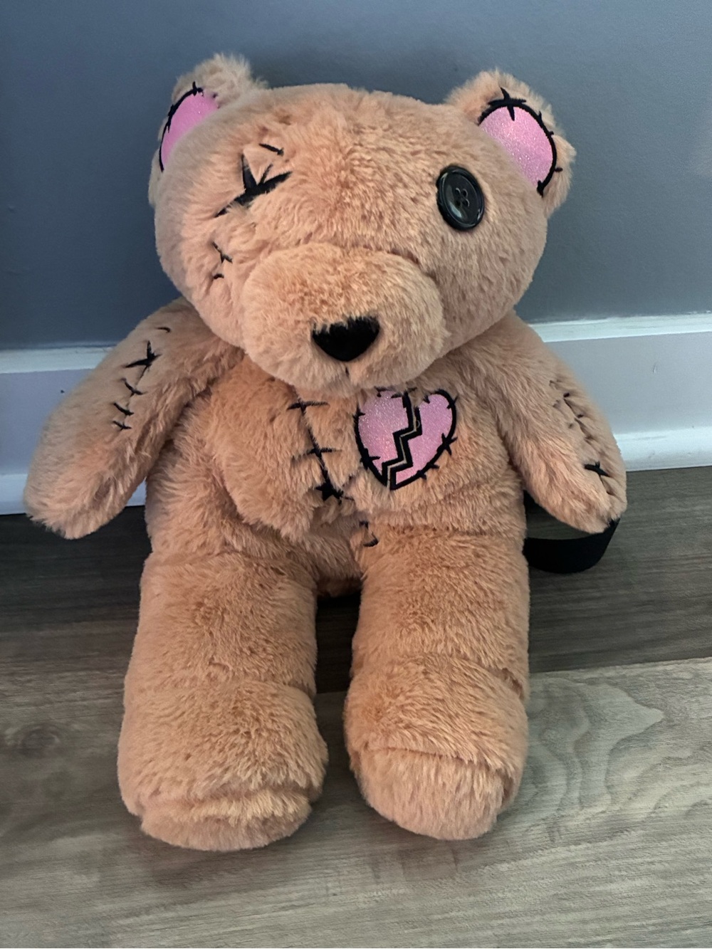 Girls Doll Bear Plush Backpack from Spirit Halloween